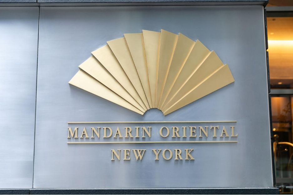 Mandarin Oriental New York exterior sign at the 2026 Family Wealth Report Awards venue. 