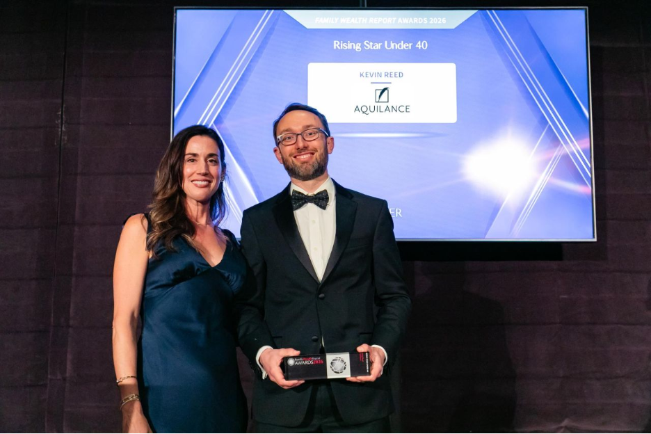 Kevin Reed of Aquilance accepting the Rising Star Under 40 trophy at the Family Wealth Report Awards on April 30, 2026. 